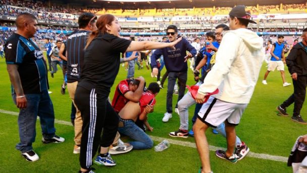 Elemento de seguridad privada se unió a la riña y golpeó a sujeto con un cinturón